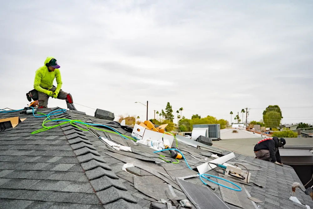 Apex Roofing Systems working on new roof for a residential home in Arizona.